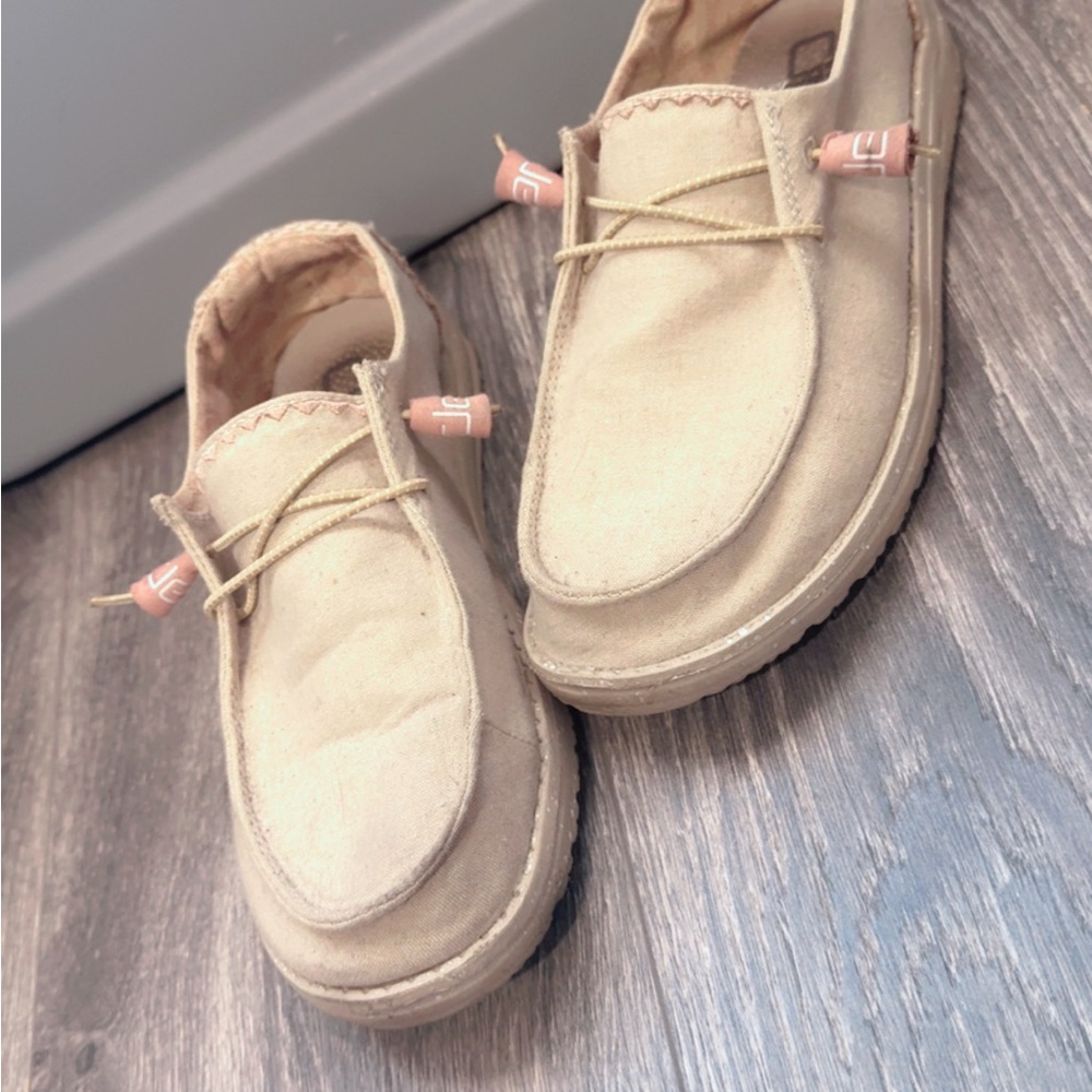 Women’s cream colored hey dudes shoes